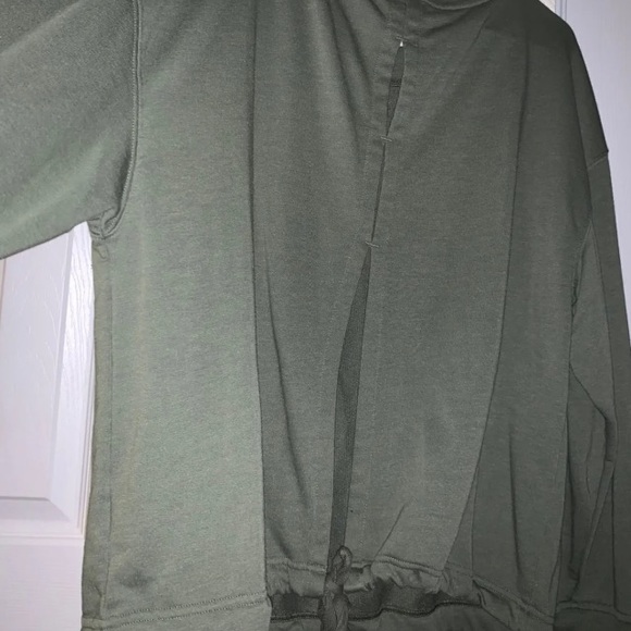 Green women’s back shown green top long sleeve - Picture 3 of 4